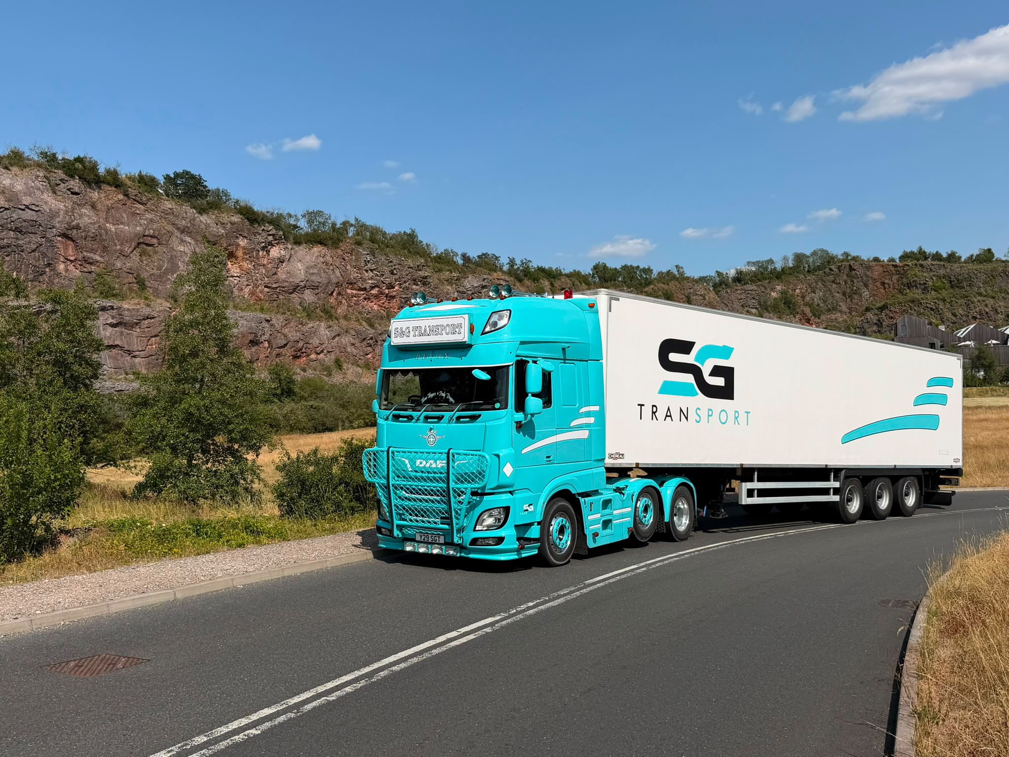 S&G Transport lorry travelling through a rocky landscape