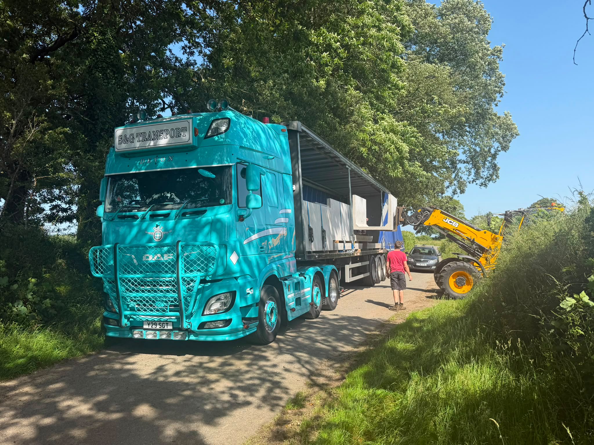 S&G Transport vehicle making a rural delivery