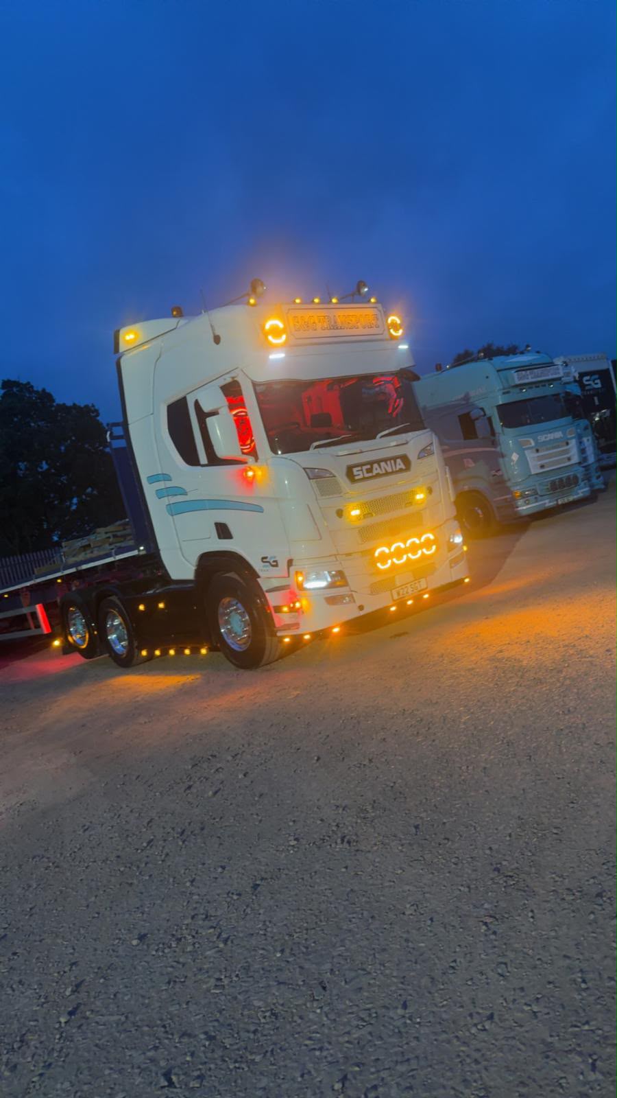 White S&G Transport vehicle at night