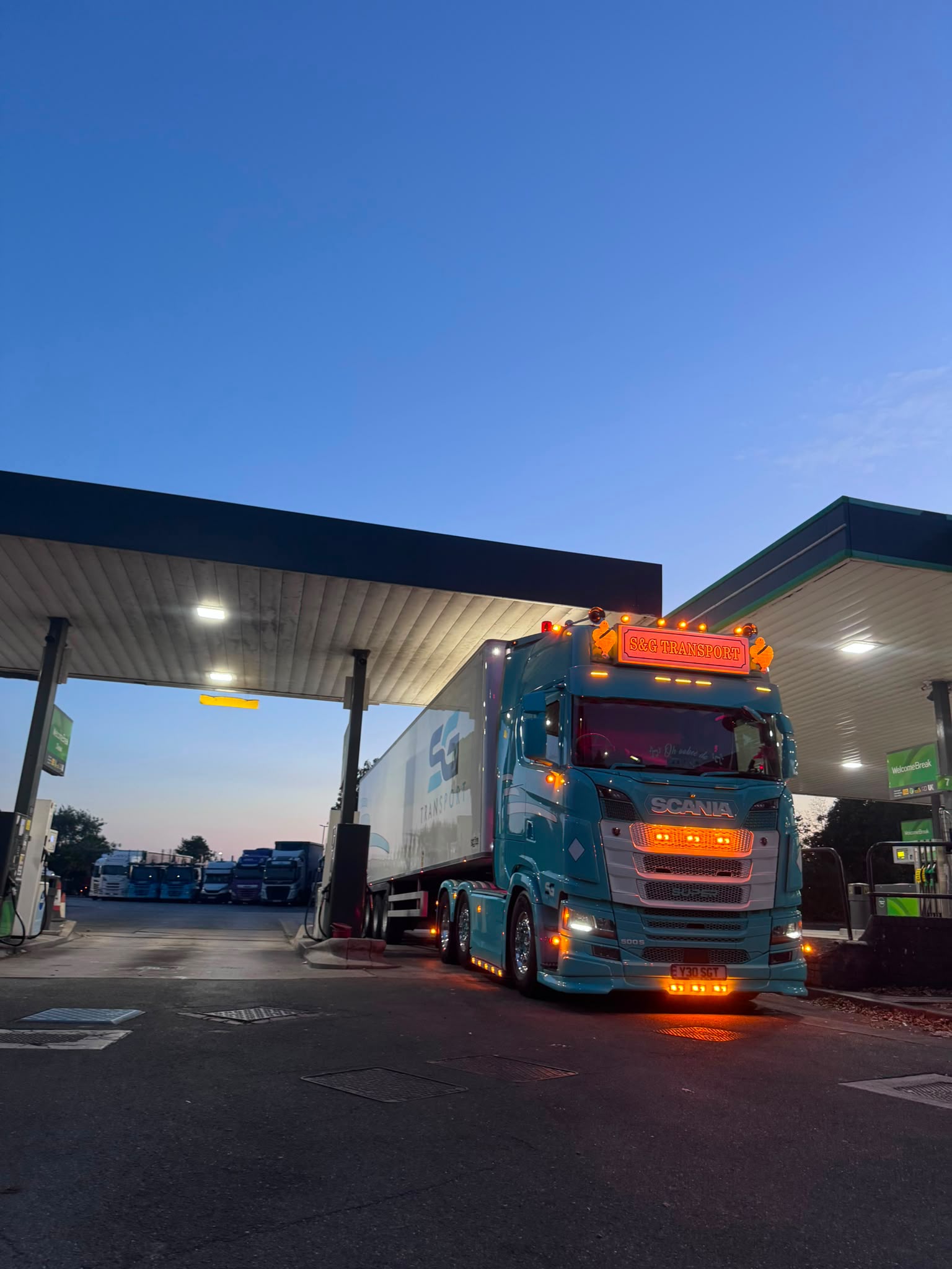 S&G Transport vehicle during an evening fuel stop