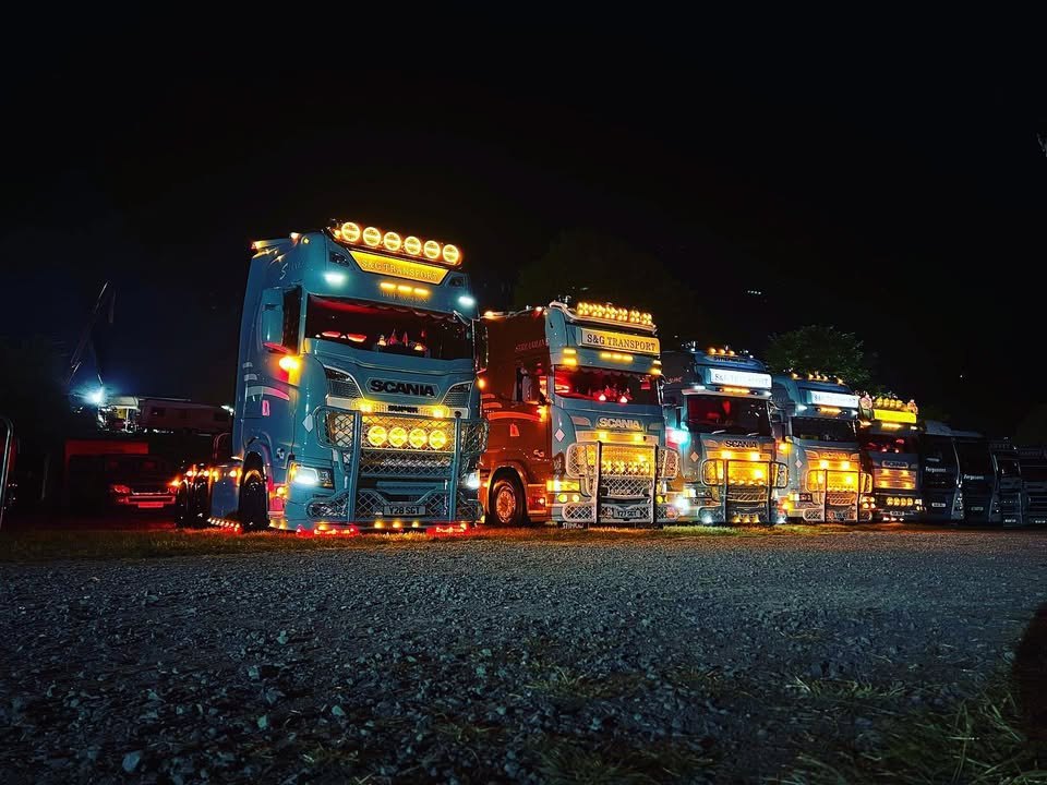 S&G Transport vehicles lit up at night